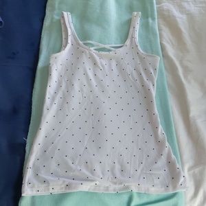 White tank top with black polka dots.
